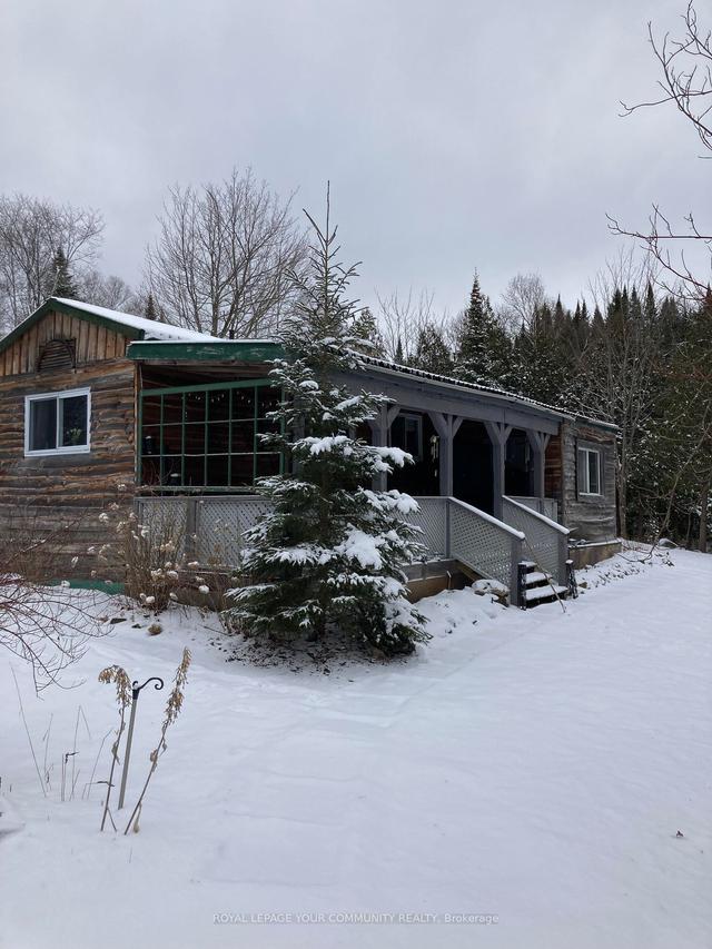 38 Highland Rd, House detached with 2 bedrooms, 1 bathrooms and 7 parking in Magnetawan ON | Image 1
