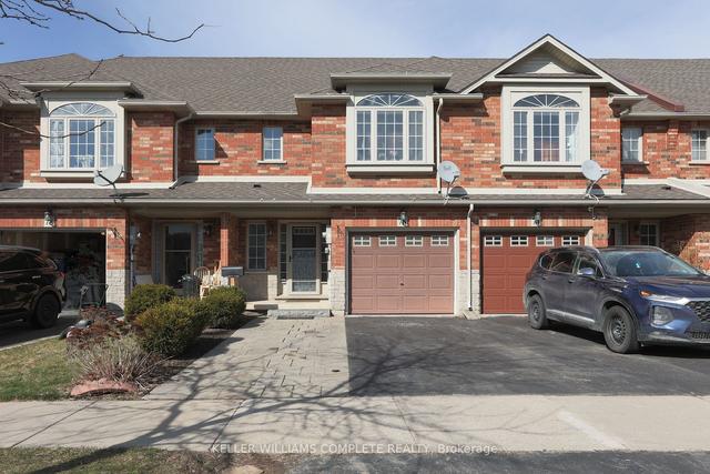 76 Magnolia Cres, House attached with 2 bedrooms, 3 bathrooms and 3 parking in Grimsby ON | Image 1