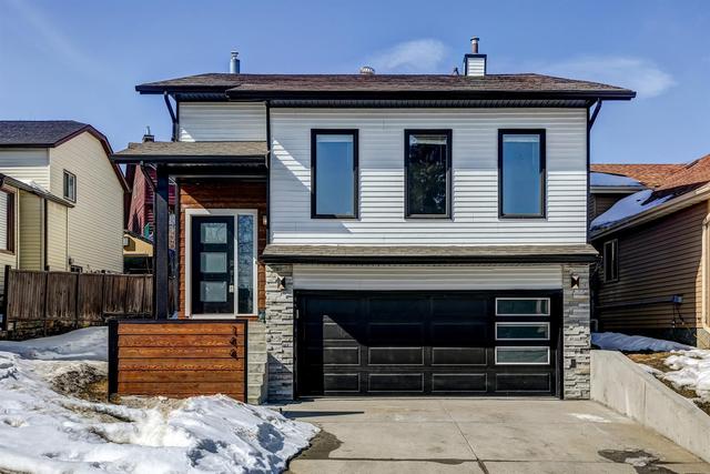 144 Macewan Glen Way Nw, House detached with 4 bedrooms, 2 bathrooms and 4 parking in Calgary AB | Image 1