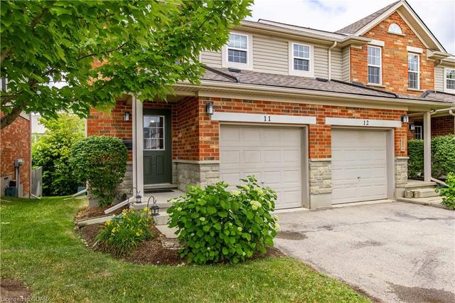 11 - 124 Gosling Gardens, House attached with 3 bedrooms, 2 bathrooms and 2 parking in Guelph ON | Image 1