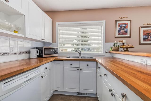 19 Millrose Place Sw, Home with 3 bedrooms, 2 bathrooms and 2 parking in Calgary AB | Image 8