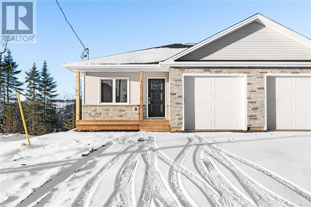 217 Teaberry Ave, House semidetached with 4 bedrooms, 2 bathrooms and null parking in Moncton NB | Card Image