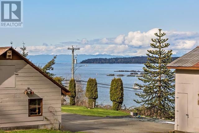 6249 Island Hwy, House detached with 3 bedrooms, 3 bathrooms and 8 parking in Comox Valley A BC | Image 52