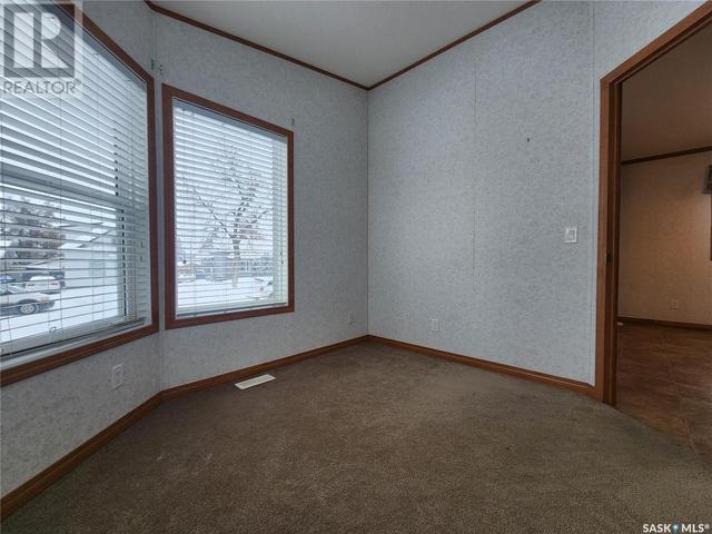 147 6th Avenue E, Home with 2 bedrooms, 2 bathrooms and null parking in Melville SK | Image 11