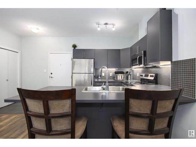 210 - 10611 117 St Nw, Condo with 2 bedrooms, 2 bathrooms and 2 parking in Edmonton AB | Image 13