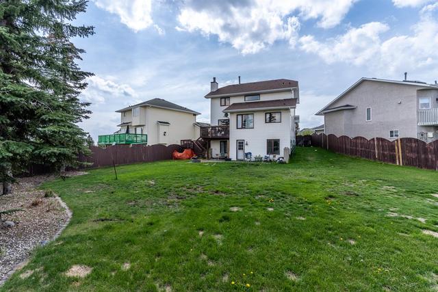 216 Arbour Summit Place Nw, House detached with 6 bedrooms, 3 bathrooms and 4 parking in Calgary AB | Image 37
