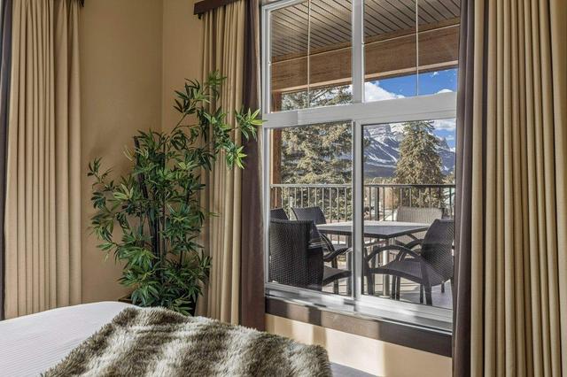 217 rot c - 1818 Mountain Avenue, Condo with 2 bedrooms, 2 bathrooms and 1 parking in Kananaskis AB | Image 3