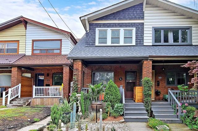 169 Kingston Rd, House semidetached with 3 bedrooms, 1 bathrooms and 2 parking in Toronto ON | Image 1