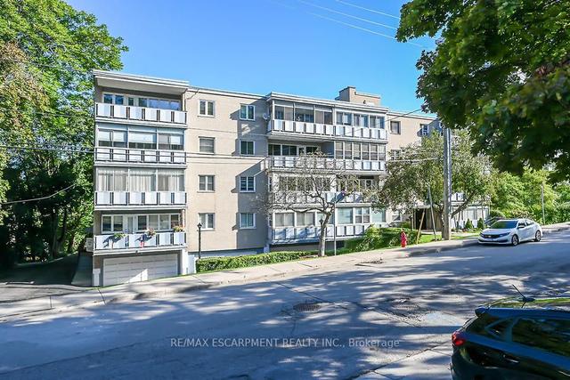 305 - 107 St. Josephs Dr, Condo with 1 bedrooms, 1 bathrooms and 1 parking in Hamilton ON | Image 1