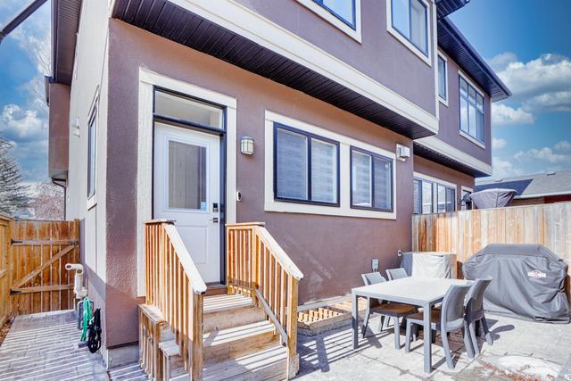 1235 Rosehill Drive Nw, Home with 4 bedrooms, 3 bathrooms and 2 parking in Calgary AB | Image 42