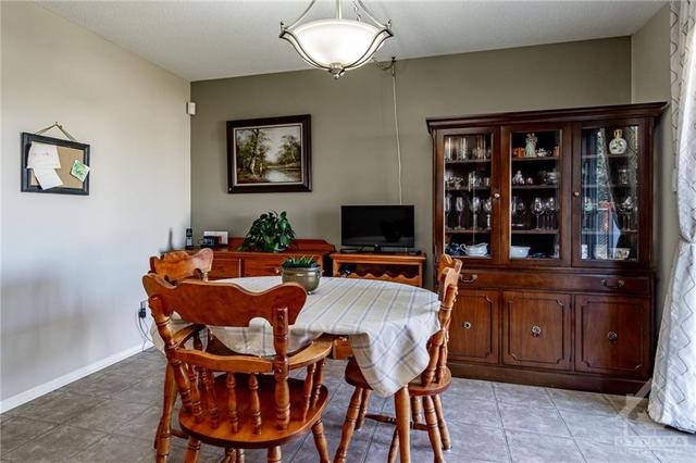 eat in area with sliding door to the backyard.. can also be used as a family room | Image 9