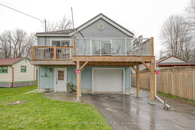 7187 Beach Dr, House detached with 2 bedrooms, 1 bathrooms and 5 parking in Ramara ON | Image 1