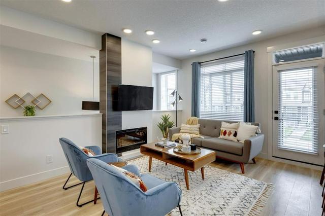 502 - 10060 46 Street Ne, Home with 3 bedrooms, 2 bathrooms and 1 parking in Calgary AB | Image 2