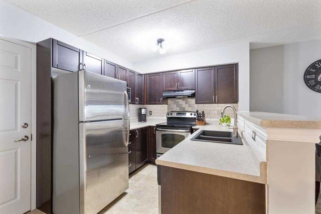 209 - 1360 Main St E, Condo with 2 bedrooms, 1 bathrooms and 2 parking in Milton ON | Image 13
