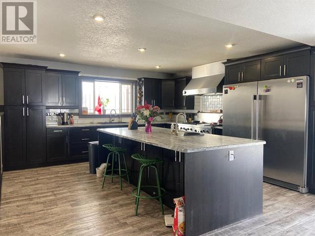225041 690, House detached with 5 bedrooms, 3 bathrooms and 15 parking in Northern Lights County AB | Image 8