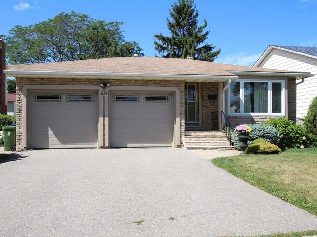 40 Wellpark Blvd, House detached with 4 bedrooms, 3 bathrooms and 4 parking in Toronto ON | Image 1