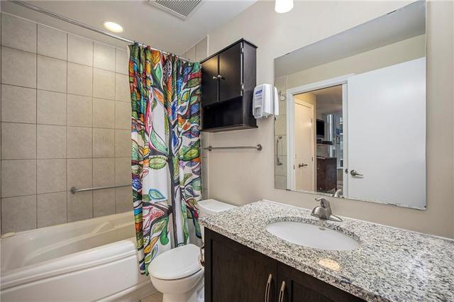 Cheater Ensuite with granite countertops,  Full Tub and Shower. | Image 20