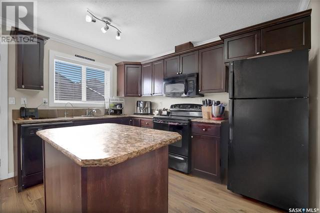 306 - 810 Hampton Circle, House detached with 4 bedrooms, 4 bathrooms and null parking in Saskatoon SK | Image 7