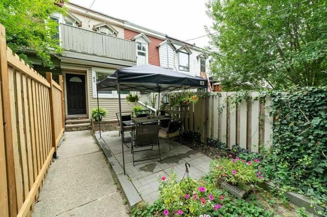 43 Blackburn St, House attached with 3 bedrooms, 2 bathrooms and 0 parking in Toronto ON | Image 1