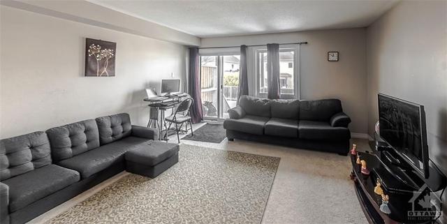 a - 415 Chapman Mills Drive, House attached with 2 bedrooms, 3 bathrooms and 1 parking in Ottawa ON | Image 12