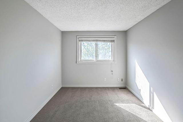 502 - 340 Falconridge Crescent Ne, Home with 3 bedrooms, 1 bathrooms and 1 parking in Calgary AB | Image 13