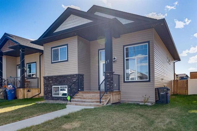 11 Hanson Green, House detached with 3 bedrooms, 2 bathrooms and 3 parking in Penhold AB | Card Image