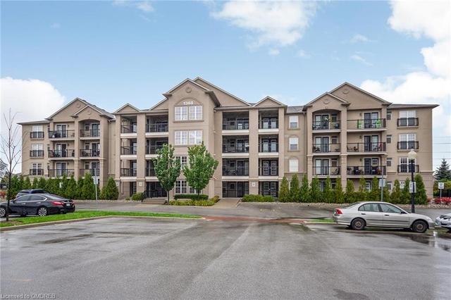 411 - 1360 Main St, Condo with 2 bedrooms, 2 bathrooms and 1 parking in Milton ON | Image 1