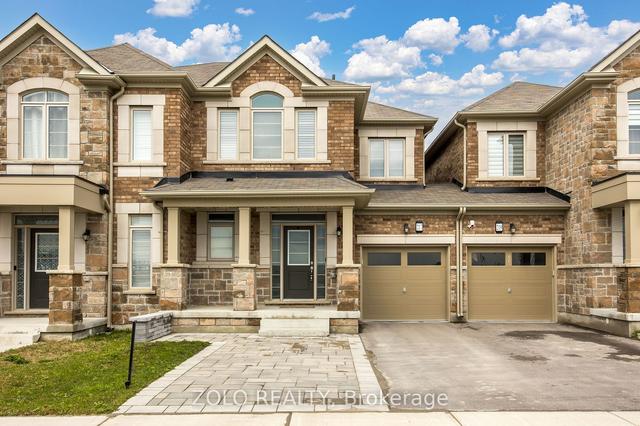 217 Jim Mortson Dr, House attached with 3 bedrooms, 4 bathrooms and 3 parking in East Gwillimbury ON | Image 1