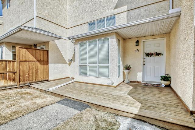 19 Millrose Place Sw, Home with 3 bedrooms, 2 bathrooms and 2 parking in Calgary AB | Image 1