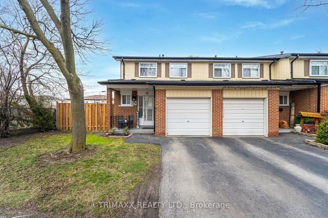 18 Vodden Crt, Townhouse with 3 bedrooms, 3 bathrooms and 2 parking in Brampton ON | Image 1