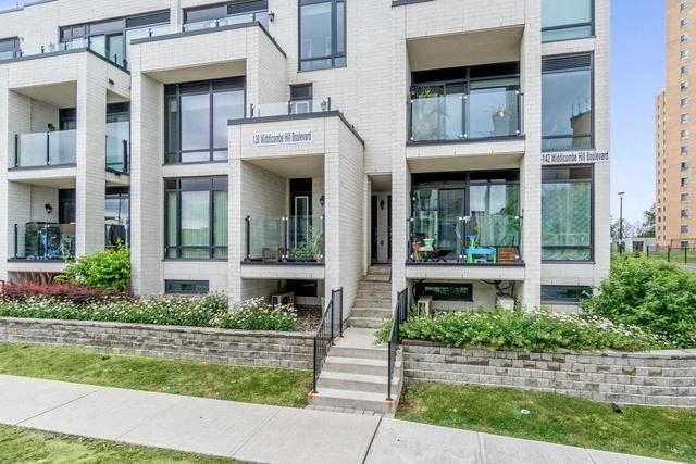 405 - 130 Widdicombe Hill Blvd, Townhouse with 2 bedrooms, 2 bathrooms and 1 parking in Toronto ON | Image 1