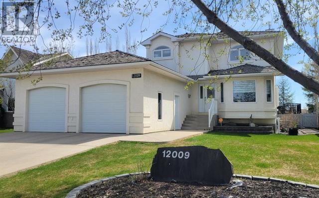12009 Cygnet Boulevard, House detached with 4 bedrooms, 3 bathrooms and 4 parking in Grande Prairie AB | Card Image