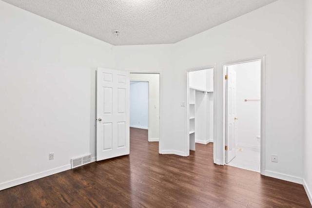 5834 Dalgleish Road Nw, Home with 5 bedrooms, 2 bathrooms and 2 parking in Calgary AB | Image 9