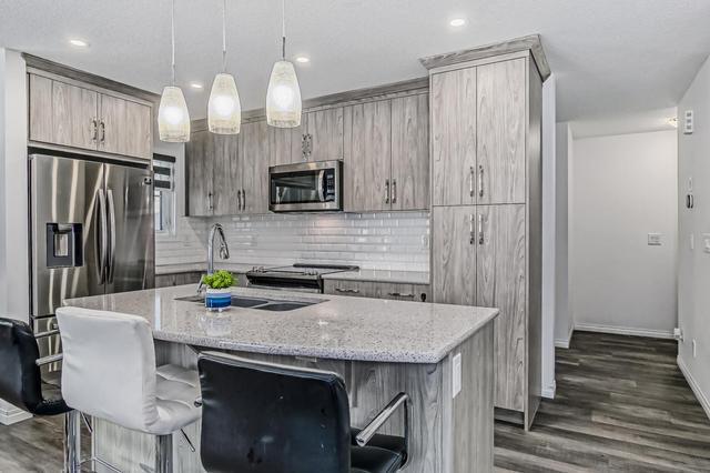 268 Carrington Way Nw, Home with 3 bedrooms, 2 bathrooms and 2 parking in Calgary AB | Image 9