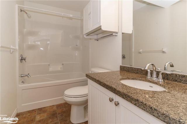 Washroom vanity has granite counter top | Image 5