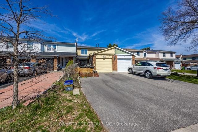 38 Pilkey Cres, House attached with 3 bedrooms, 2 bathrooms and 3 parking in Toronto ON | Image 1