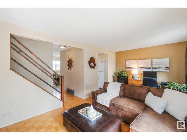 1142 Millbourne Rd E Nw, House attached with 3 bedrooms, 2 bathrooms and null parking in Edmonton AB | Card Image