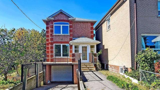 22 Leyton Ave, House detached with 5 bedrooms, 4 bathrooms and 4 parking in Toronto ON | Image 1