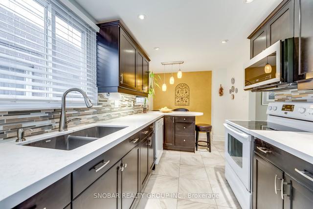 18 Van Camp Pl, House attached with 4 bedrooms, 2 bathrooms and 3 parking in Toronto ON | Image 4