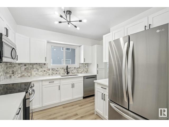 59 - 4403 Riverbend Rd Nw, House attached with 3 bedrooms, 1 bathrooms and 1 parking in Edmonton AB | Image 6