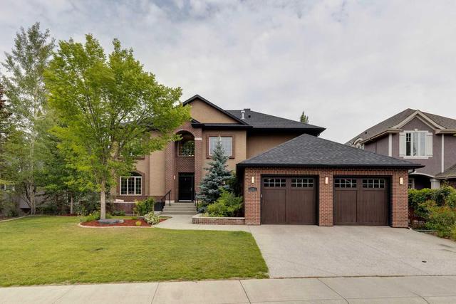 72 Discovery Valley Cove Sw, Home with 5 bedrooms, 5 bathrooms and 4 parking in Calgary AB | Image 1