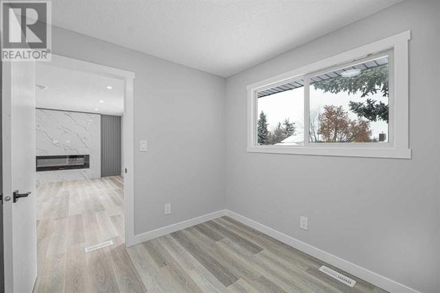 11111 Braxton Road Sw, House detached with 4 bedrooms, 3 bathrooms and 4 parking in Calgary AB | Image 7