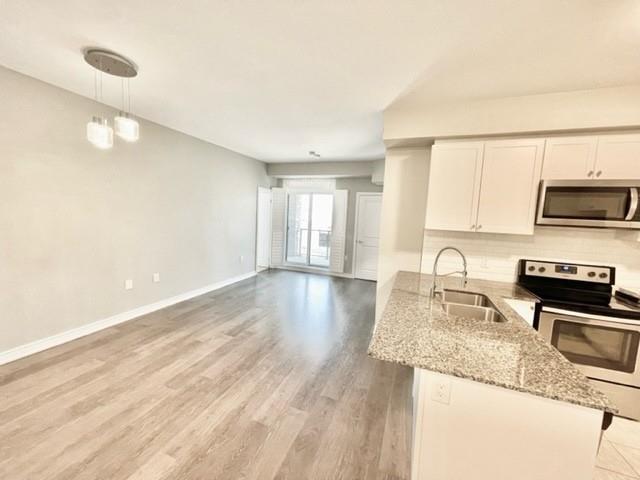 303 - 2388 Khalsa Gate, Townhouse with 2 bedrooms, 2 bathrooms and 2 parking in Oakville ON | Image 2