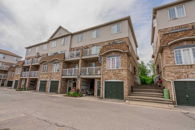 60 - 200 Mclevin Ave, Townhouse with 3 bedrooms, 2 bathrooms and 1 parking in Toronto ON | Image 1