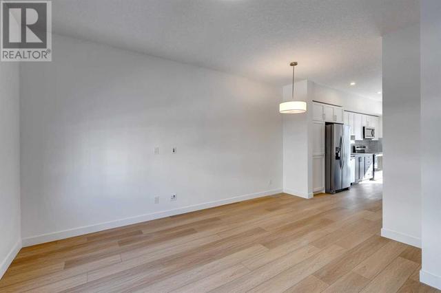 205, - 8535 19 Avenue Se, House attached with 2 bedrooms, 1 bathrooms and 2 parking in Calgary AB | Image 12