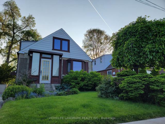 44 Meighen Ave, House detached with 4 bedrooms, 3 bathrooms and 2 parking in Toronto ON | Image 1