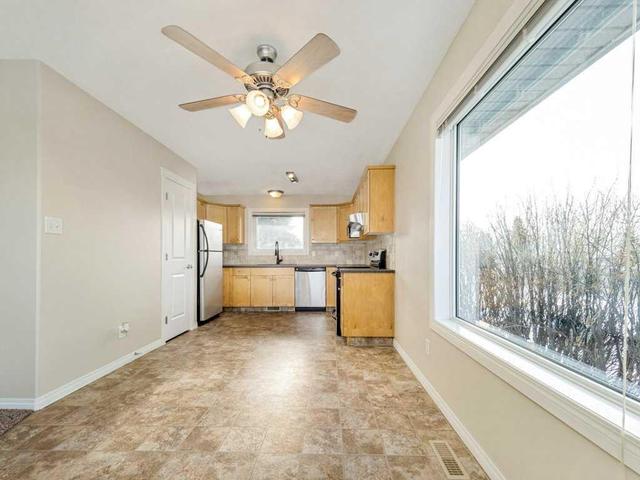 1102 44 Avenue N, Home with 3 bedrooms, 1 bathrooms and 3 parking in Lethbridge AB | Image 4