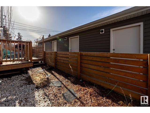 12511 115 Av Nw, House attached with 3 bedrooms, 2 bathrooms and null parking in Edmonton AB | Image 37