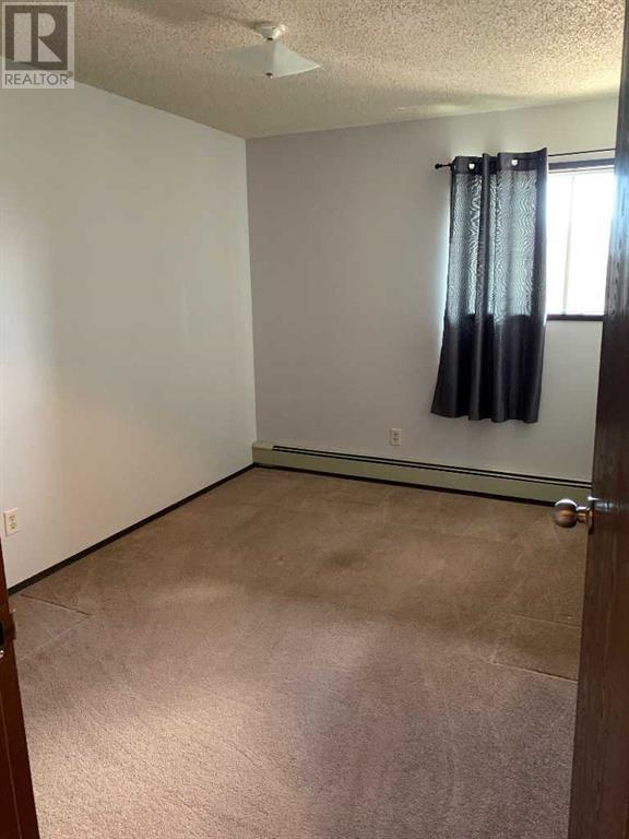 203, - 405 Columbia Boulevard W, Condo with 2 bedrooms, 1 bathrooms and null parking in Lethbridge AB | Image 8