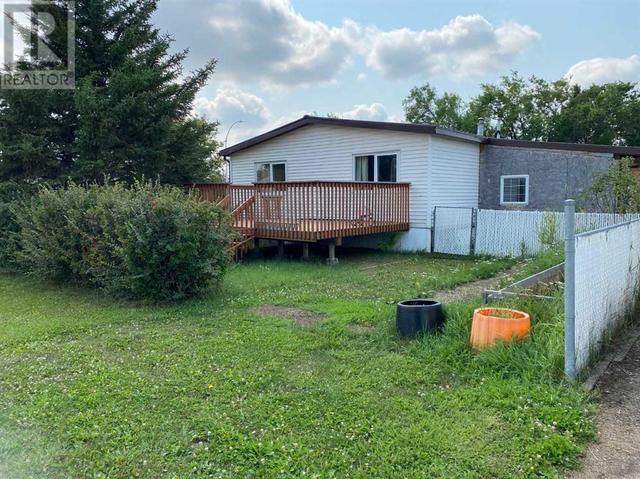 6402 51 Street, House other with 3 bedrooms, 2 bathrooms and 6 parking in Ponoka AB | Image 6